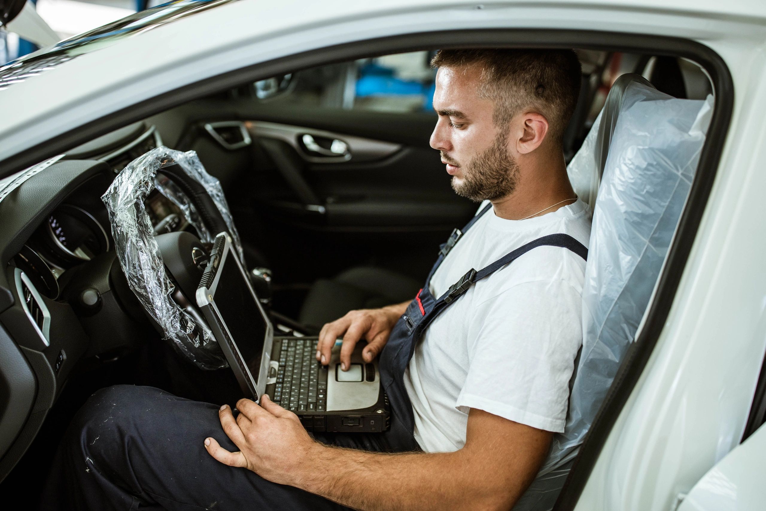 Vehicle diagnostics and module coding using a laptop (Automotive Programming Kenya Ltd)